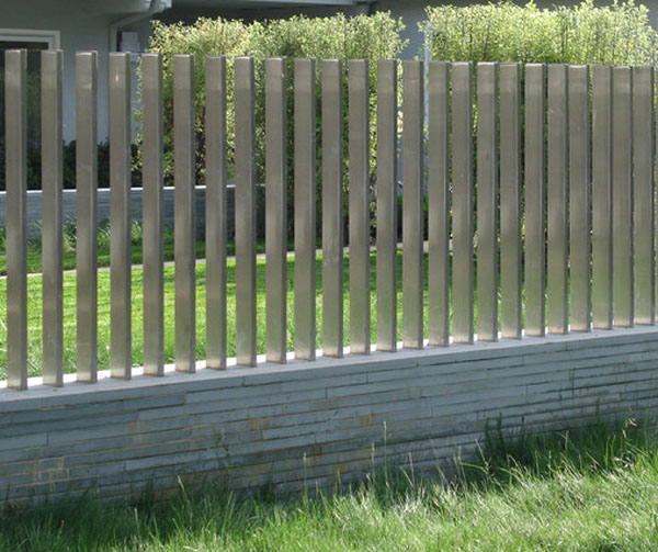 Modern fence by wood